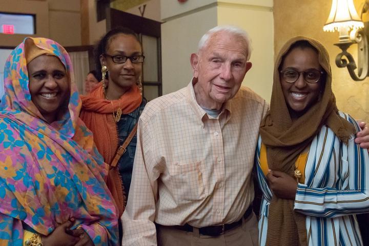 Henry Bloch with students and family